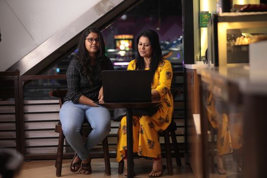 Female Employs with Computer in a office