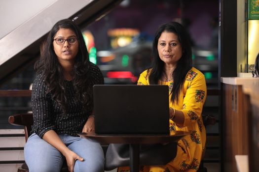 Female Employs with Computer in a office