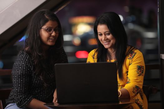Female Employs with Computer in a office