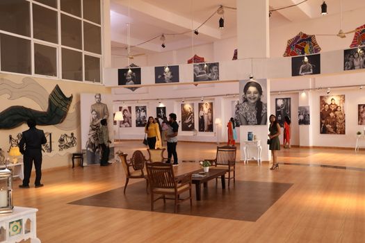 People Visits And See The Photo Exhibition