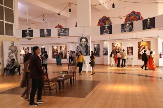 People Visits And See The Photo Exhibition