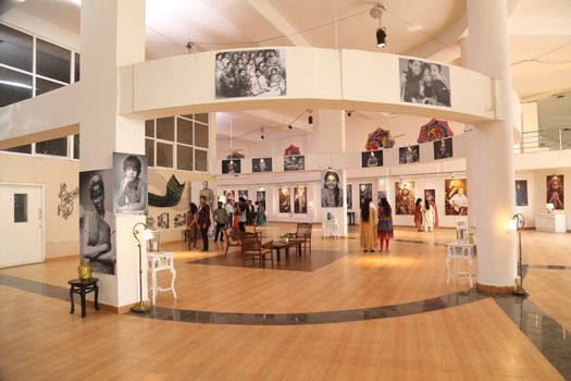 People Visits And See The Photo Exhibition