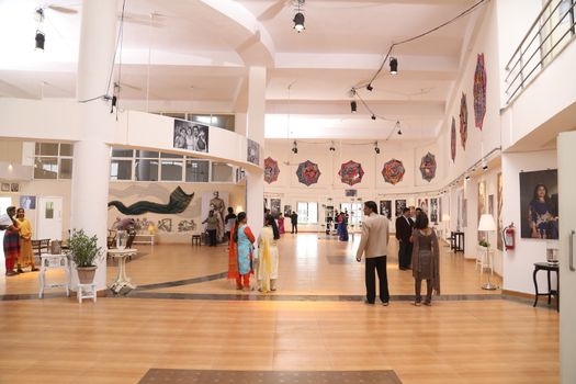 People Visits And See The Photo Exhibition