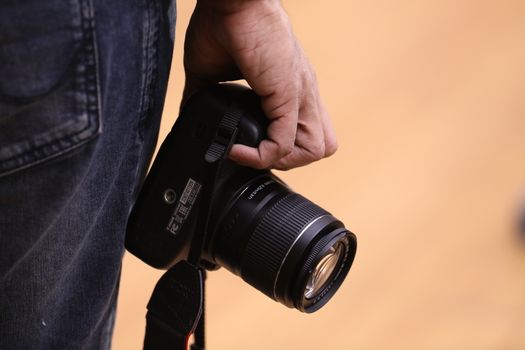 Camera in a Male Hand