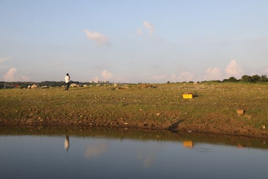 silhouette of man at Lake