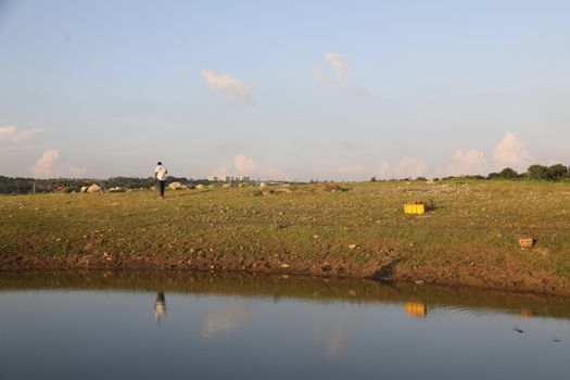 silhouette of man at Lake