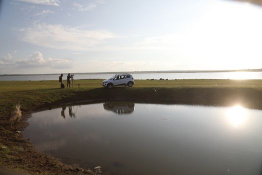 Photographer at Lake in the work