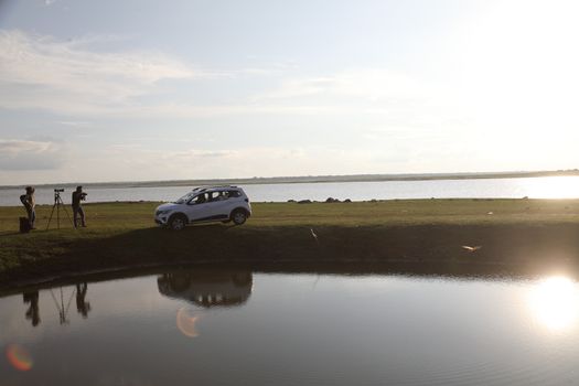 Photographer at Lake in the work