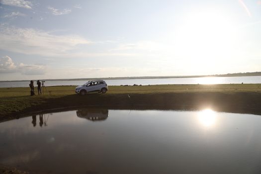 Photographer at Lake in the work