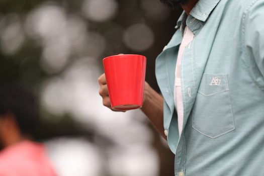 Male hand with cup