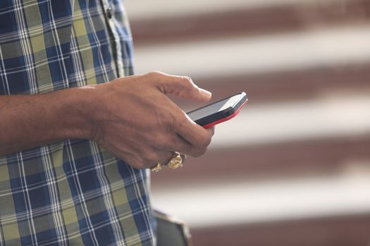 Male Model hands with cell phone