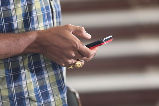 Male Model hands with cell phone