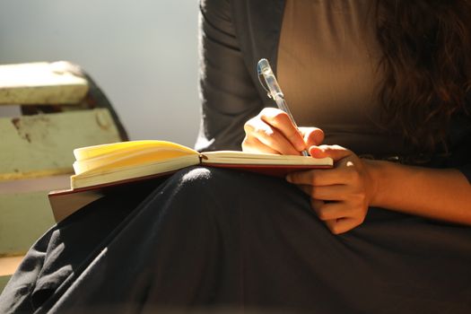 Female Hand with Pen