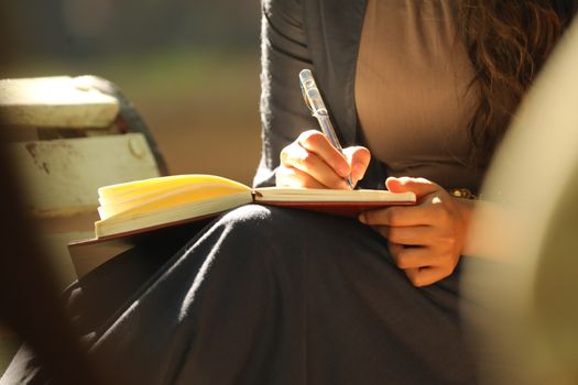 Female Hand with Pen