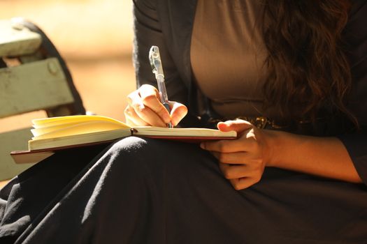 Female Hand with Pen