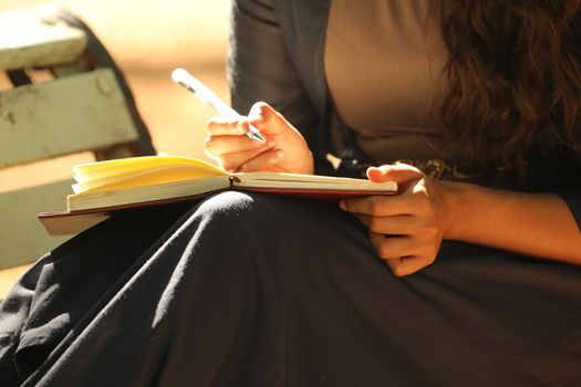 Female Hand with Pen
