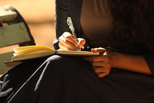 Female Hand with Pen