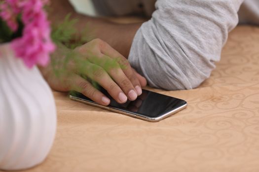 Male Model hands with cell phone