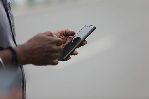 Male Model hands with cell phone