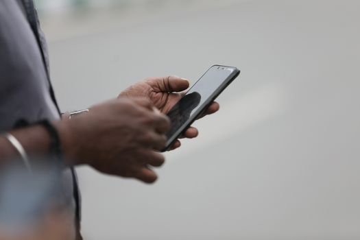 Male Model hands with cell phone