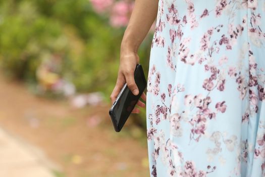 Female hands with cell phone