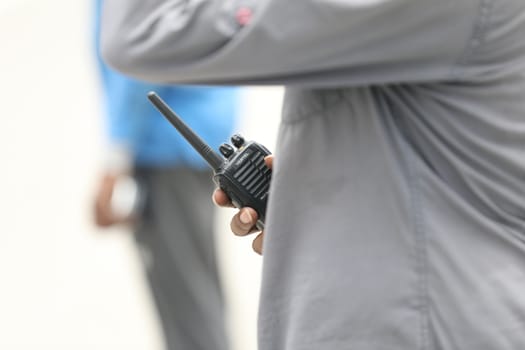 Man using walkies-talkie