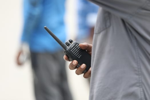 Man using walkies-talkie