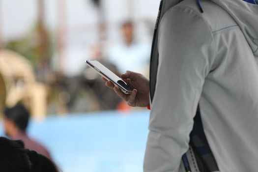 Male Model hands with cell phone