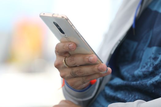 Male Model hands with cell phone