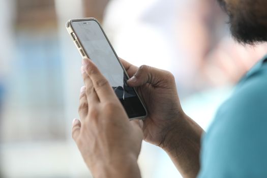 Male Model hands with cell phone