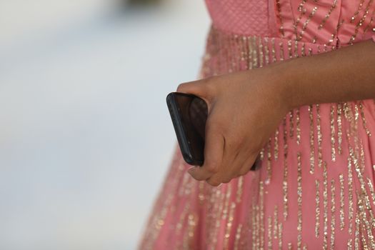 Female hands with cell phone
