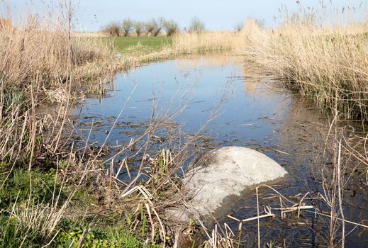 Concrete culvert pipe hole system draining sewage water, the Netherlands