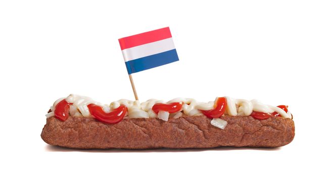 One frikadel with ketchup, mayonnaise on chopped onions, a Dutch fast food snack called 'frikadel speciaal', the Netherlands