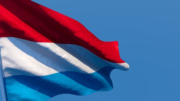 3D rendering of the national flag of Netherlands waving in the wind against a blue sky
