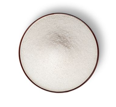 Sugar in bowl top view isolated on white background