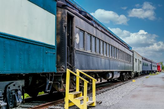 An old abandoned railroad train on tracks