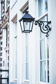 Architectural detail of a building on the main city center street of Amsterdam in Netherlands, european architecture