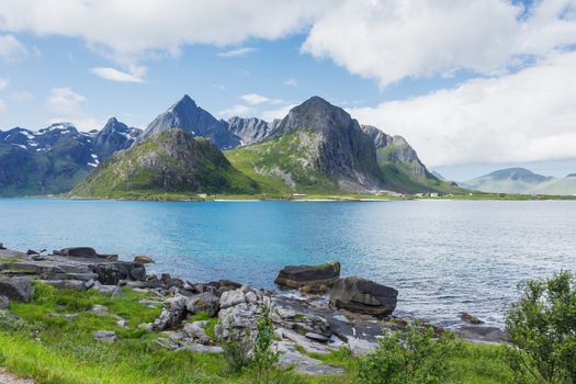 Beautiful scandinavian landscape with meadows, mountains and fjords. Lofoten islands, Norway.