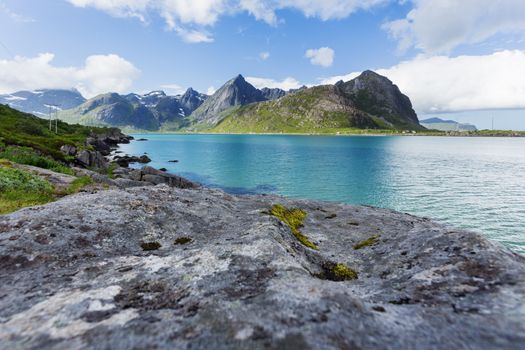 Beautiful scandinavian landscape with meadows, mountains and fjords. Lofoten islands, Norway.