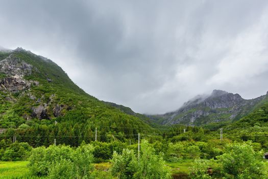 Beautifull scandinavian landscape with meadows and mountains. Lofoten islands, Norway.