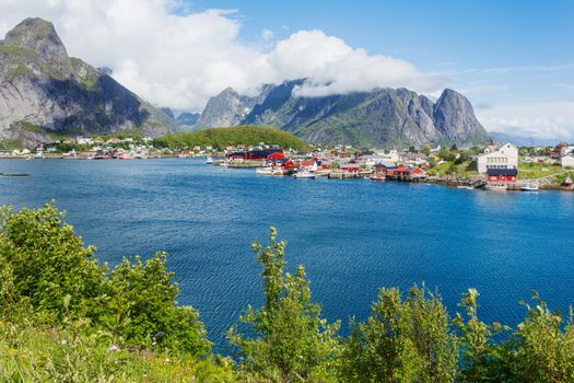 Beautiful scandinavian landscape with mountains and fjords. Panorama view of Reine village on Lofoten islands, Norway.