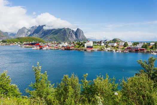 Beautiful scandinavian landscape with mountains and fjords. Panorama view of Reine village on Lofoten islands, Norway.