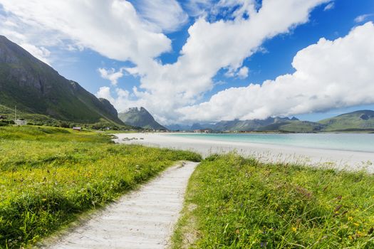 Rambergstranda beach on Lofoten islands. Beautiful sandy beach and azure water. Norway.