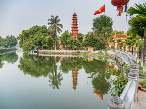 details of vietnan temples with reflections in the lake