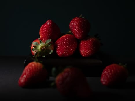 fresh strawberries on dark background