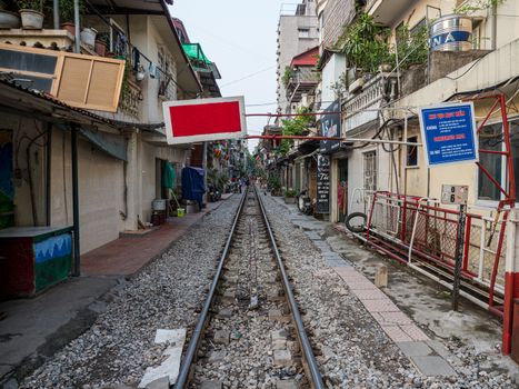 train tracks very close to buildings