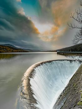 waterfall in a swamp, spectacular sky