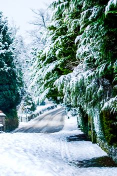 Snowy Road through a Lake District Landscape in Winter UK