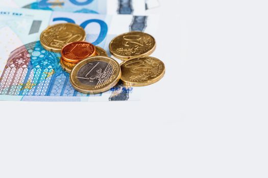 Euro coins and banknotes. European money, official currency of 19 of 28 member states of the European Union. Copy space.