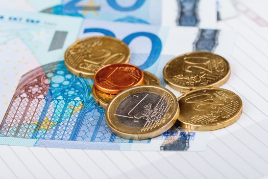 Euro coins and banknotes. European money, official currency of 19 of 28 member states of the European Union.